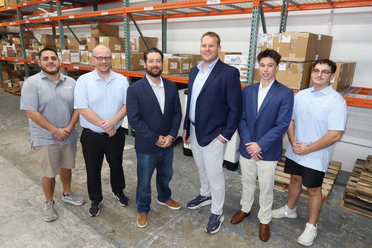 The Skytop Aero team in the warehouse, from left: Julian Robinson, Thomas Wegener, Thomas McQuade, Tom Wojciechowski, Logan Murphy and Lorenzo DiSorbo
